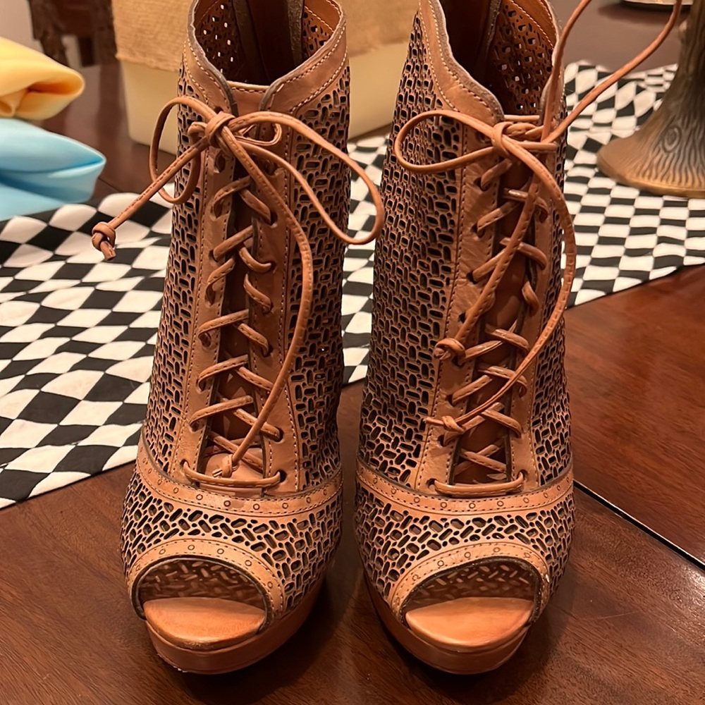 Schutz brown high heel lace up boots